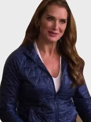 A Castle For Christmas Sophie Brown Blue Puffer Jacket