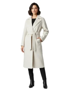 A model showcases the Christmas Unwrapped coat Charity Jones style, featuring a longline cut and belted waist, perfect for holiday coat collections.