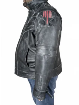 Left profile perspective of the men's black armor leather jacket, showcasing the detailed shoulder padding with red graphic stripes and structured forearm ridges.