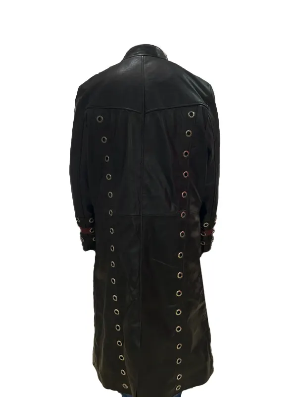 Rear view of the long black leather WWE Edge Royal Rumble Trench Coat highlighting two parallel vertical rows of silver grommets running down the back.