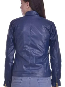 Close-up of a premium leather outerwear piece with a stand-up collar and smooth zipper closure.