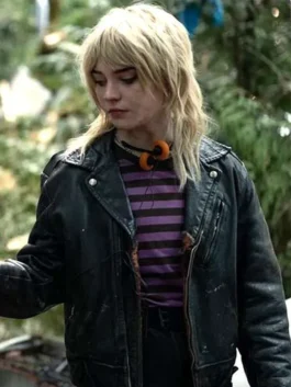 Teen Natalie Yellowjackets in her black leather jacket and striped top, close-up shot.