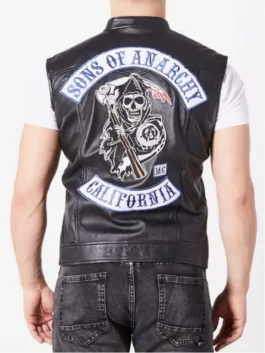 Back view of a man in a black jax vest sons of anarchy leather cut with the Reaper logo and Sons of Anarchy California back patch.