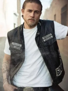 Charlie Hunnam as Jax Teller wearing a distressed samcro leather sons of anarchy vest with President and Redwood Original patches.