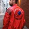 Model wearing Akira Kaneda red jacket showing the back fit and pill logo, demonstrating the style of this Akira mens leather outerwear.