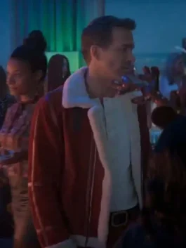 Spirited Ryan Reynolds Jacket captured from a dance scene showing red shearling Santa jacket style for winter fashion.