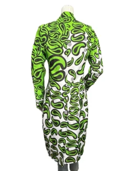 A long green and white printed cotton coat with a lapel collar and double-breasted button closure on a hanger.