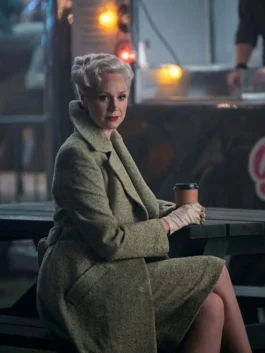 Women's long green textured coat with a sharp tailored fit and wide lapels