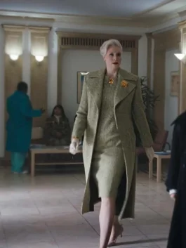 Professional tailored coat in a textured green fabric with formal lapel design