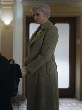 Sophisticated olive green floor-length overcoat featuring a classic structured silhouette