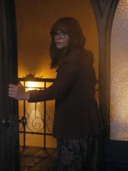 Women's vintage-style brown corduroy jacket with a tailored waist and button front