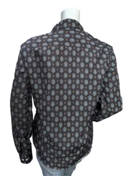 Back view of the Beth Dutton Yellowstone Season 5 dark brown button-up shirt on a mannequin, showcasing the all-over geometric Southwestern pattern.