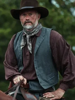 James Badge Dale as John Dutton Sr. in 1923 wearing a charcoal grey heritage wool vest while riding a horse.