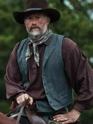 James Badge Dale as John Dutton Sr. in 1923 wearing a charcoal grey heritage wool vest while riding a horse.