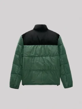 Two-tone puffer jacket with a high collar and quilted horizontal baffles.