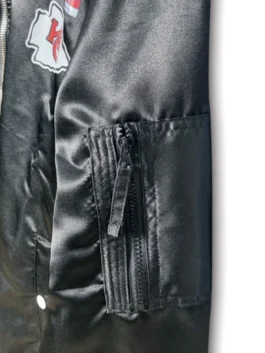 Close-up of the team embroidery on a Kansas City Chiefs Black Bomber Jacket.