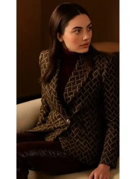 Women's brown patterned double-breasted blazer with a sharp lapel collar and a single gold-tone button closure.