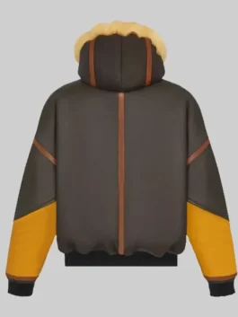 Back view of the Mary J. Blige Power Book II Ghost Brown Jacket. This angle of the Monet Tejada Brown Leather Shearling Jacket shows the solid brown back panel, contrasting yellow accents on the sleeves, and the plush shearling hood.