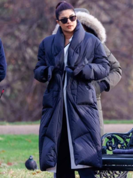 Front view of the Citadel 2023 Nadia Sinh Puffer Coat showcasing its quilted pattern and long sleeves.