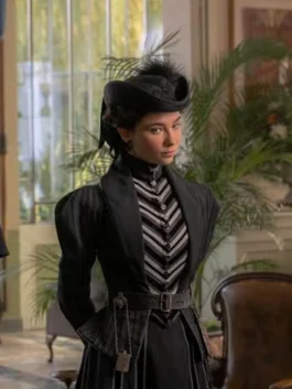 Matilda De Angelis as Lidia Poët wearing a Victorian-style puffed-sleeve black blazer.