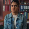 Women's classic light blue denim jacket with buttoned chest pockets and a folded collar.