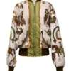 Emily in Paris Horse Jacket shown from the front on Emily Cooper in a colorful outdoor scene.