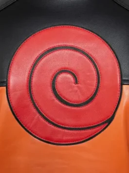 Close-up of the premium leather texture and zipper detail on an orange Naruto-themed jacket.