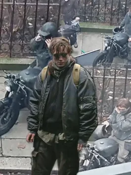 The Drifter Batman wearing a rugged bomber jacket from The Batman Drifter outfit, styled with a motorbike look inspired by Bruce Wayne’s street persona.