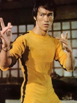 Side view of the Bruce Lee Yellow Tracksuit showing the black leg stripes from America Jackets.