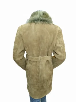 Rear view of the Emmanuelle Chriqui suede coat featuring a belted waist and plush faux fur collar, inspired by the Lana Lang coat Superman and Lois.