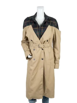 Close-up of the green and blue plaid collar and shoulder detail on a premium tan cotton trench coat.