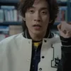 Close-up of the Woo-jin Bloodhounds varsity jacket with white sleeves and "B" patch.