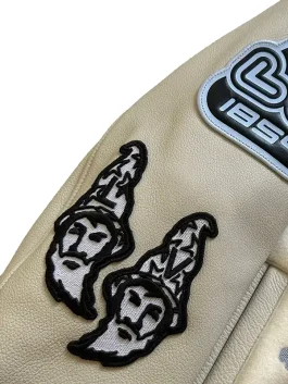 Louis Vuitton Bugs Bunny jacket in cream wool and leather with LV varsity design, showcasing the playful Bugs Bunny Louis Vuitton artwork.