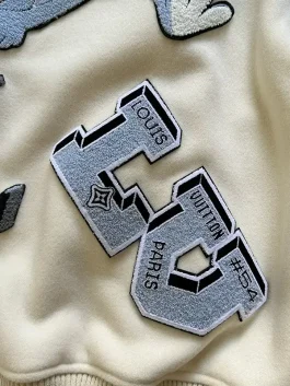 Louis Vuitton bunny varsity jacket with signature LV patches and Bugs Bunny design, a premium LV varsity jacket for collectors.