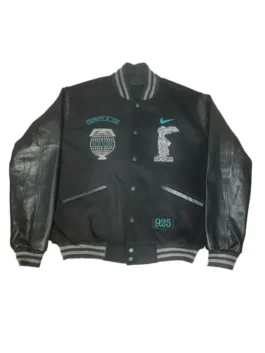Full-body view of the black and leather Tiffany Nike jacket (varsity style) laid flat. The front features the 