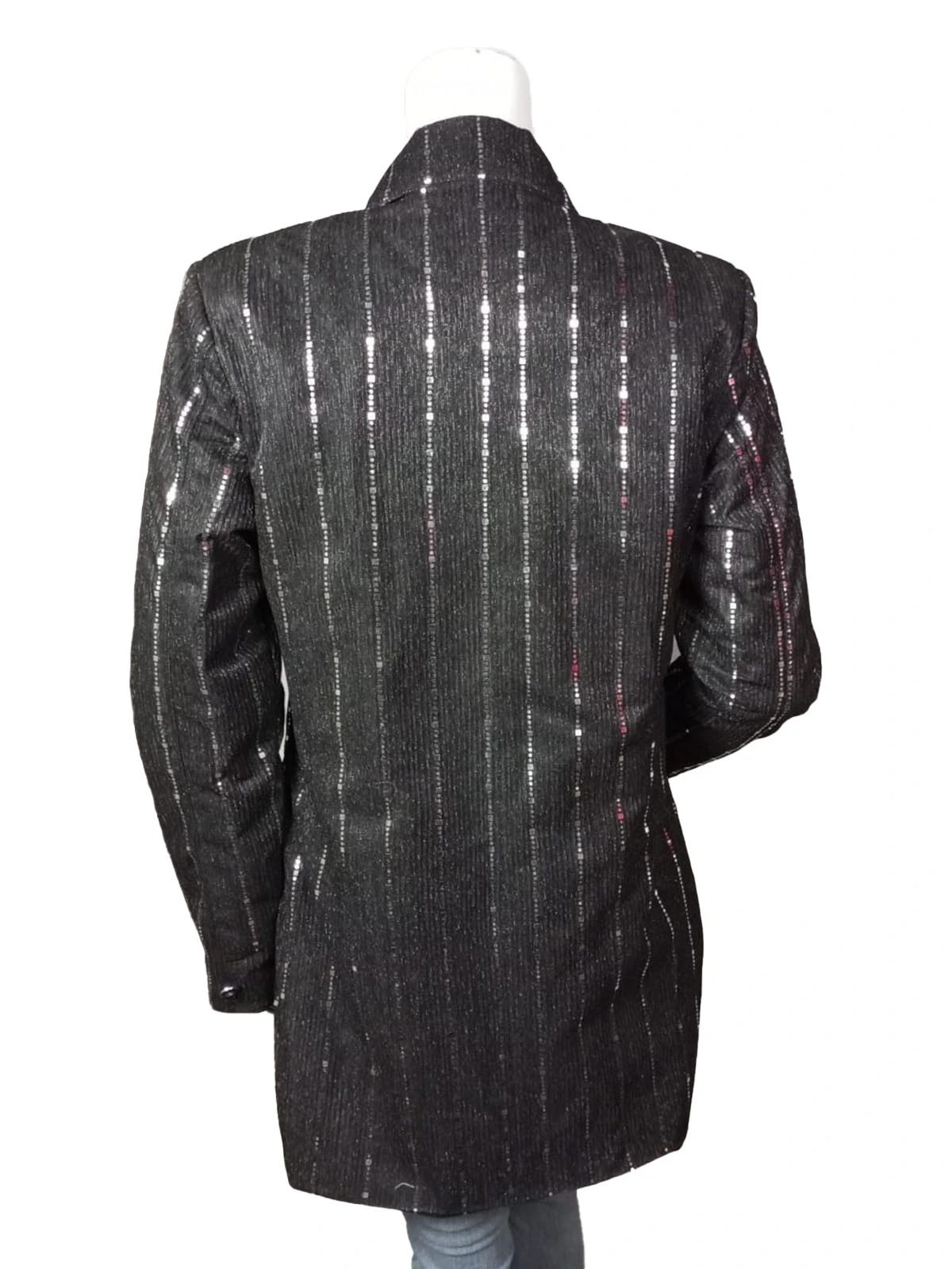 Women’s double-breasted sequin blazer featuring a sophisticated lapel collar and shimmering vertical stripes.