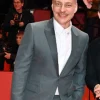 she-came-to-me-2023-tom-wlaschiha-grey-suit