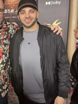 Versatile black bomber jacket made from durable fabric, ideal for men's everyday wear.