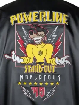 A man wearing the black and yellow Disney Powerline Tour bomber jacket featuring the 