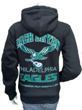 A comfortable pullover hoodie featuring Zach Bryan Philadelphia Eagles branding on the chest and an eagle graphic on the pocket.
