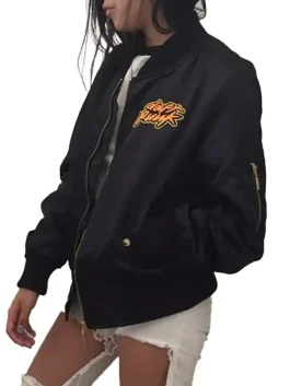 Side view of model in Daft Punk Bomber Jacket featuring satin finish, rib cuffs, and golden zipper details.