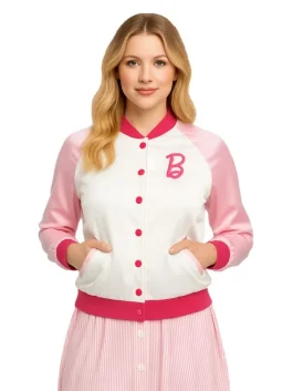 Front view of a woman in a white and pink Barbie varsity jacket with an embroidered 'B' logo on the chest.