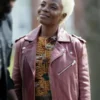 Elena Powell (played by Marsha Stephanie Blake) in The Madness 2024 wearing a mauve asymmetrical leather biker jacket with gold hoop earrings.
