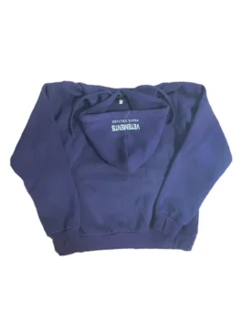 A styling shot of the black Vetements hoodie showing the full fit from America Jackets.