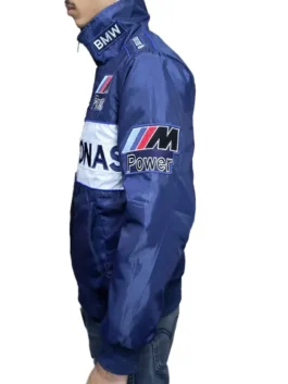Side profile of a BMW Petronas Sauber F1 Racing Team Jacket showing the white Petronas stripe and BMW M Power patches on the arm and high collar.
