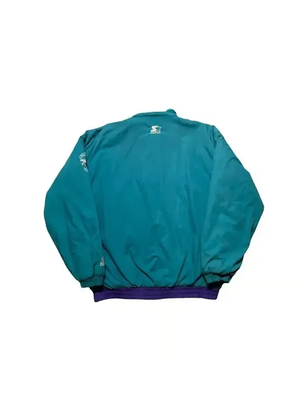Back side of NBA All Star Game Vintage 90’s Charlotte Hornets Jacket with clean teal finish, authentic Charlotte Hornets Jacket representing 90’s retro NBA style.