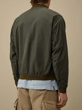 Back-Side-Of-the-Grey-Contrast-Flatt-Nylon-Bomber-Jacket-On-a-Male-Model