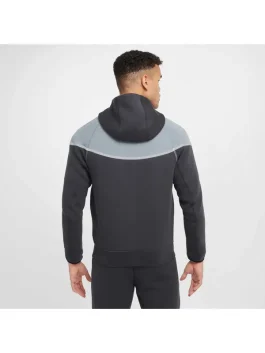 Back of grey Nike Tech full reflective tracksuit showing dual-tone hood and reflective strip.