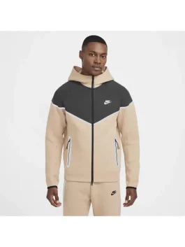 Front side of cream Nike Tech reflective jacket and matching pants featuring full-zip and reflective design.