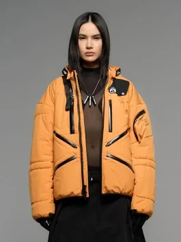 Front view of Death Stranding 2 jacket in orange with zippered accents and sleek design.